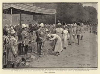 La revue des troupes indiennes au palais de Buckingham par le roi, Sa Majesté remettant des médailles aux représentants indiens